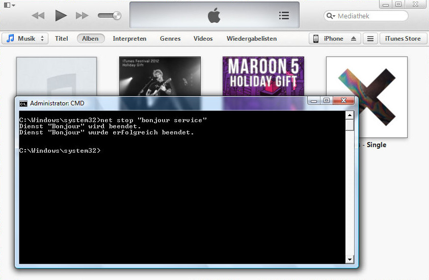 Fixing Windows the Unix way ;-) Screenshot of iTunes and the CMD window